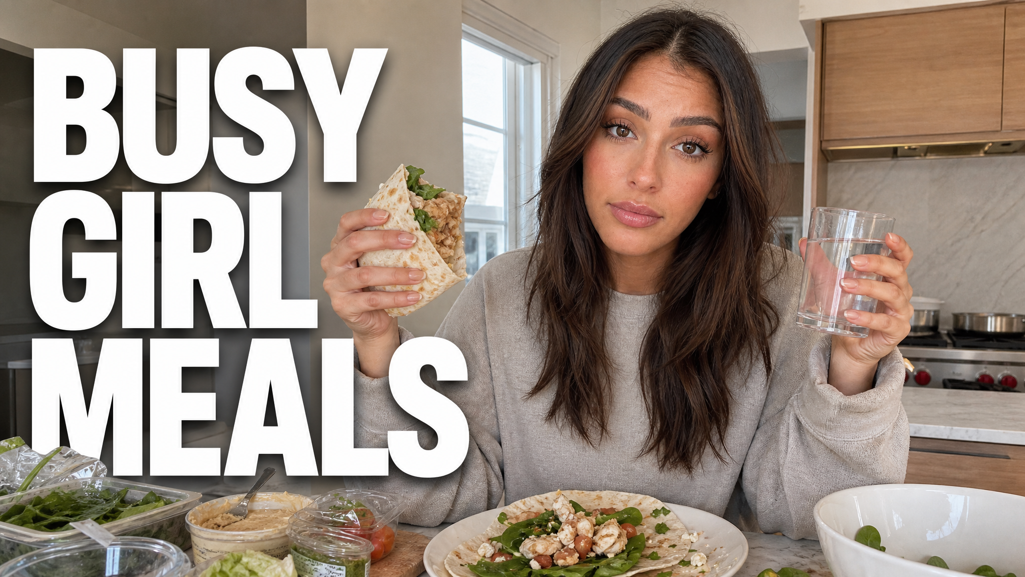 Fitness thumbnail idea for a healthy meals video: a creator at a kitchen counter holding a wrap and a glass of water